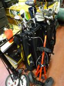 Excellent quantity of golf clubs and manual trollies