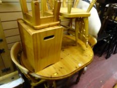 Small oval dining table with centre pull-out having four chairs, a high stool and a pine box