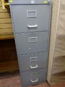 Modern four drawer metal filing cabinet and cane open bookshelves