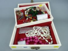Quantity of costume jewellery in a vintage case