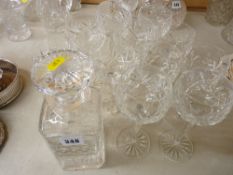 Good quantity of long stemmed wine goblets and a square based decanter with stopper