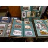 Approximately eight hundred plus vintage postcards contained in five albums