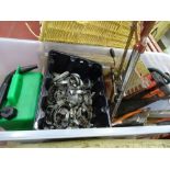 Plastic tub of wormdrive clips, mitre saw and other associated garage items