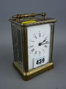 Vintage brass cased carriage clock with key