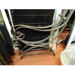 Two pairs of metal sculptured garden bench/seat ends