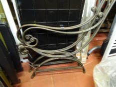 Two pairs of metal sculptured garden bench/seat ends