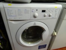 Indesit IWD7 1250 washing machine and a Panasonic 1500w vacuum cleaner E/T