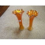 Pair of carnival glass stem vases