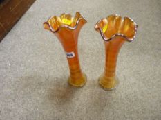 Pair of carnival glass stem vases