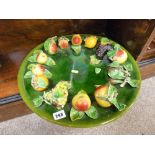 Large Majolica style plate decorated with fruit and leaves