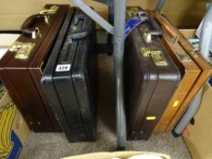Four executive's briefcases