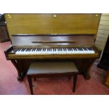 Bechstein oak cased upright piano with a modern mahogany piano stool with music sheet contents