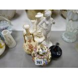 Two parian style figures, painted porcelain jar and cover and two small bud vases