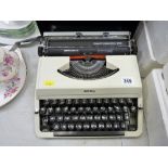 Portable Imperial typewriter in carry case