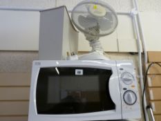 White compact microwave oven, desk fan and an office shredder E/T