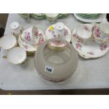 Twenty one piece hand painted rose and gilt edged Shelley teaset with a vintage style lamp globe