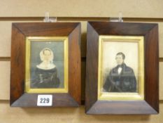 Pair of mid 19th Century naive watercolour portraits in rosewood frames
