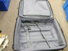 Modern neat wheeled canvas suitcase