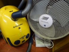 Electrolux 'The Boss' 3105 cylinder vacuum cleaner and a Micromark desktop fan E/T