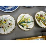 Two Victorian plates and a comport handpainted with orchids and gilt edged