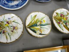Two Victorian plates and a comport handpainted with orchids and gilt edged