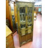 A PRIORY STYLE OAK CORNER CUPBOARD with leaded lattice glass doors, 170 cms high, 72 cms wide