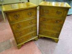 A GOOD PAIR OF REPRODUCTION YEW WOOD NEAT FOUR DRAWER CHESTS, 74 cms high, 45 cms wide, 33.5 cms