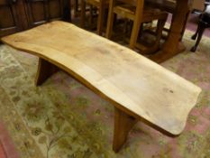 A RUSTIC JOINED PLANK COFFEE TABLE, 38 cms high, 122 cms long, 53 cms wide
