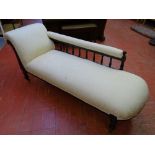 A GOOD EBONIZED EDWARDIAN CHAISE LONGUE with modern upholstery, 75 cms maximum height, 180 cms long,