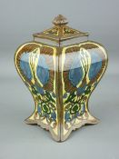 A FOLEY INTARSIO TEA CADDY & COVER of waisted form with Egyptian style decoration (lid damaged and