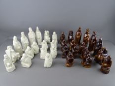 A RARE SET OF CERAMIC CHESS PIECES of stylized form by Margaret Holder (possibly ex Poole
