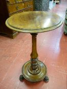 A MAHOGANY PEDESTAL SIDE TABLE with brass metamorphic fitting and label stamped 'Chinnock's Patent