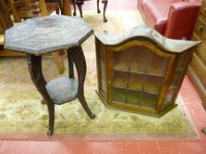 A DRAGON CARVED SIDE TABLE and an oak wall hanging display cabinet