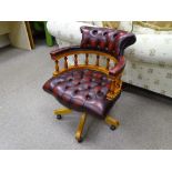 AN ANTIQUE STYLE SWIVEL CAPTAIN'S CHAIR