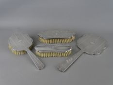 A FOUR PIECE SILVER HAND MIRROR & BRUSHES DRESSING TABLE SET, Continental and Import 925 marks,