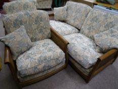 AN ERCOL BERGERE & UPHOLSTERED THREE PIECE LOUNGE SUITE, 84 cms high, 188 cms wide the couch
