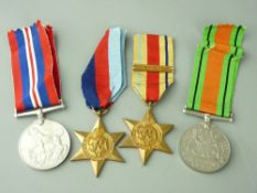 WORLD WAR II MEDALS - two un-named groups to include a mounted trio with Atlantic Star with France