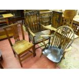 AN ERCOL STICKBACK ARMCHAIR, a vintage oak armchair and an antique oak farmhouse chair