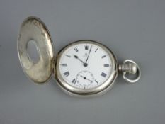 AN OMEGA SILVER CASED HALF HUNTER POCKET WATCH, the movement stamped 'Omega 5879237', Dennison watch