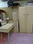 A RETRO FOUR PIECE LIMED OAK BEDROOM SUITE, 181 cms high, 91 cms wide the wardrobe