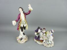 TWO RUDOLSTADT VOLKSTEDT PORCELAIN FIGURINES of a well dressed gentleman in a purple coat and a