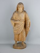 A POSSIBLY CONTINENTAL CARVED WOOD FIGURINE of Christ, 57 cms high, initialled 'A W' to the base
