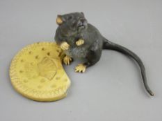 A 20th CENTURY COLD PAINTED BRONZE FIGURINE OF A RAT with biscuit, the base stamped 'Bergman' with