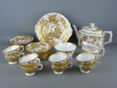 A TWENTY EIGHT PIECE ROYAL CROWN DERBY GOLD AVES TEASET to include eight place setting trios, lidded
