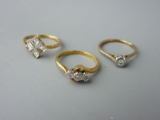 THREE DIAMOND SET GOLD RINGS to include a nine carat gold and platinum single stone in illusion