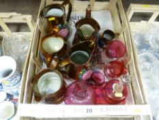 Parcel of cranberry glass including a large bell, a bulbous vase with square neck and five large