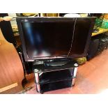 Panasonic 32 ins LCD TV and a chrome and black stand E/T