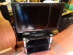 Panasonic 32 ins LCD TV and a chrome and black stand E/T