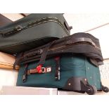 Three canvas suitcases