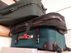 Three canvas suitcases